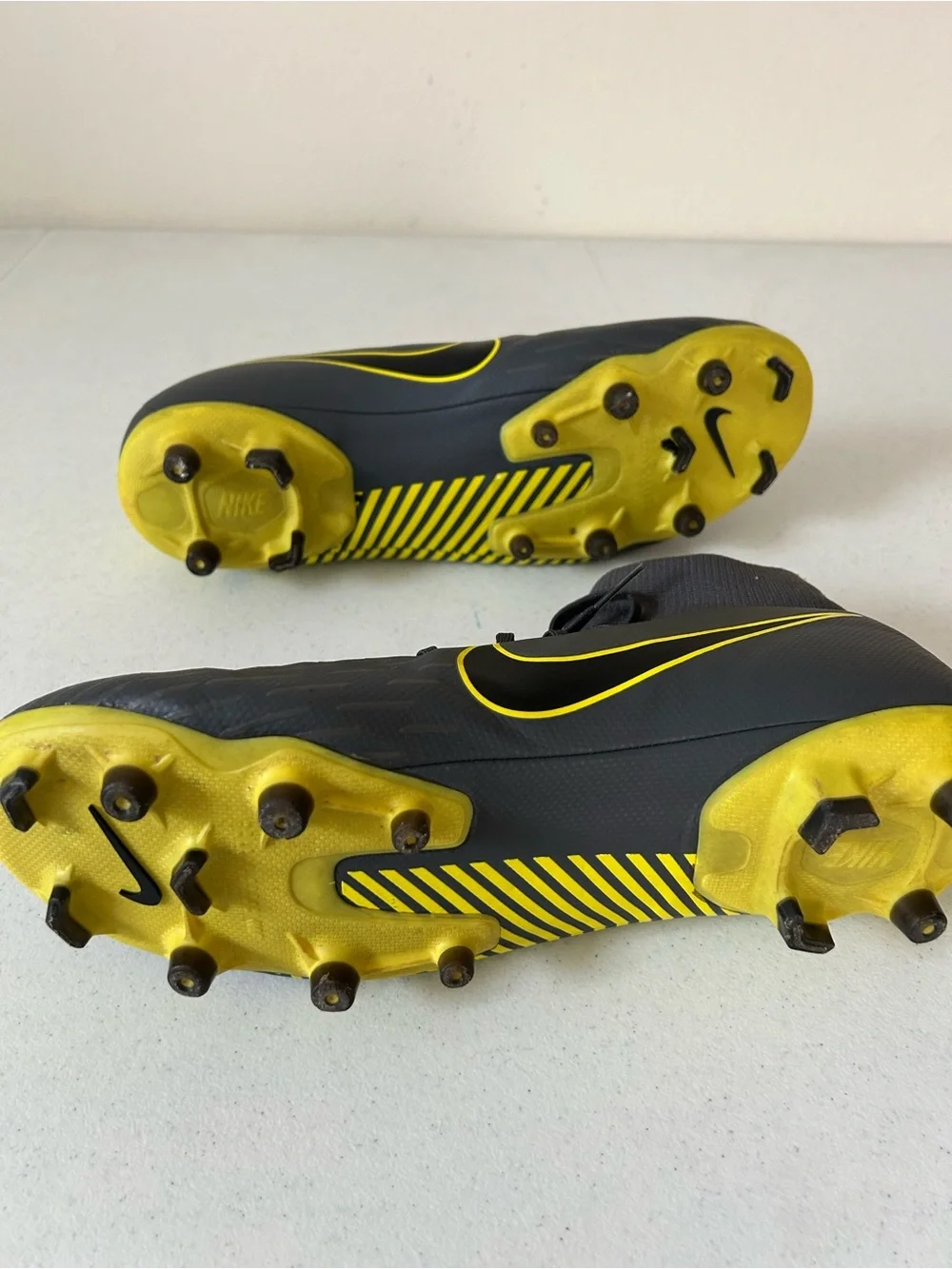 Nike Men’s Black Soccer Cleats with Yellow Swoosh